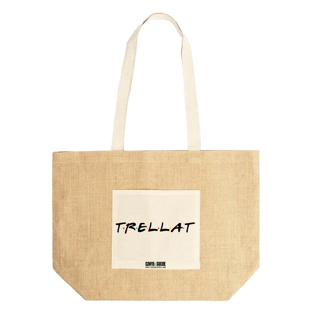 Bossa de platja de yute natural amb butxaca de cotó i disseny "Trellat" en tipografia estil Friends, de Canya de Sucre