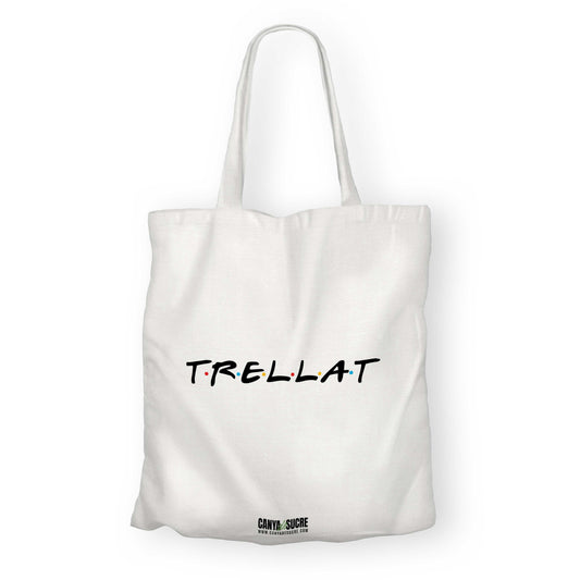 Totebag blanca amb la paraula “Trellat” en tipografia negra amb detalls de colors, disseny minimalista de Canya de Sucre.