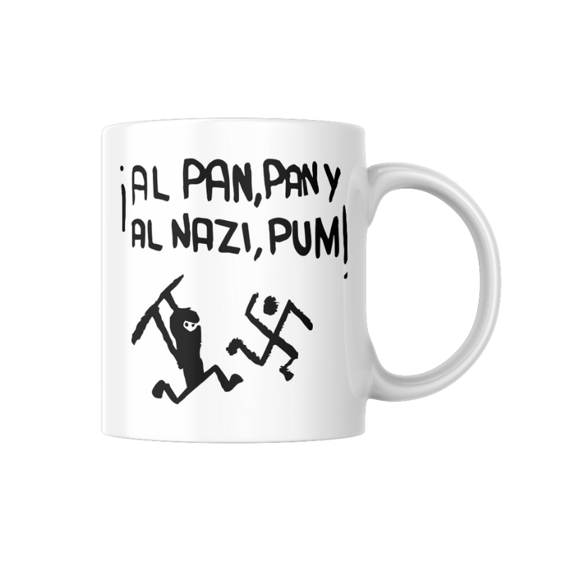 Tassa blanca amb el text “¡Al pan, pan y al nazi, pum!” i il·lustració antifeixista en negre, disseny reivindicatiu i valent de Canya de Sucre.